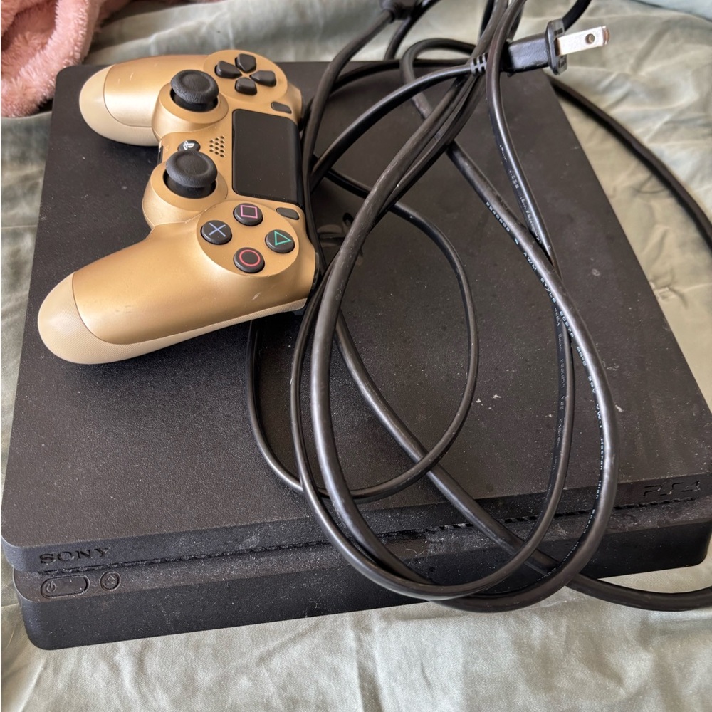 Sony PlayStation Console with Gold Controller